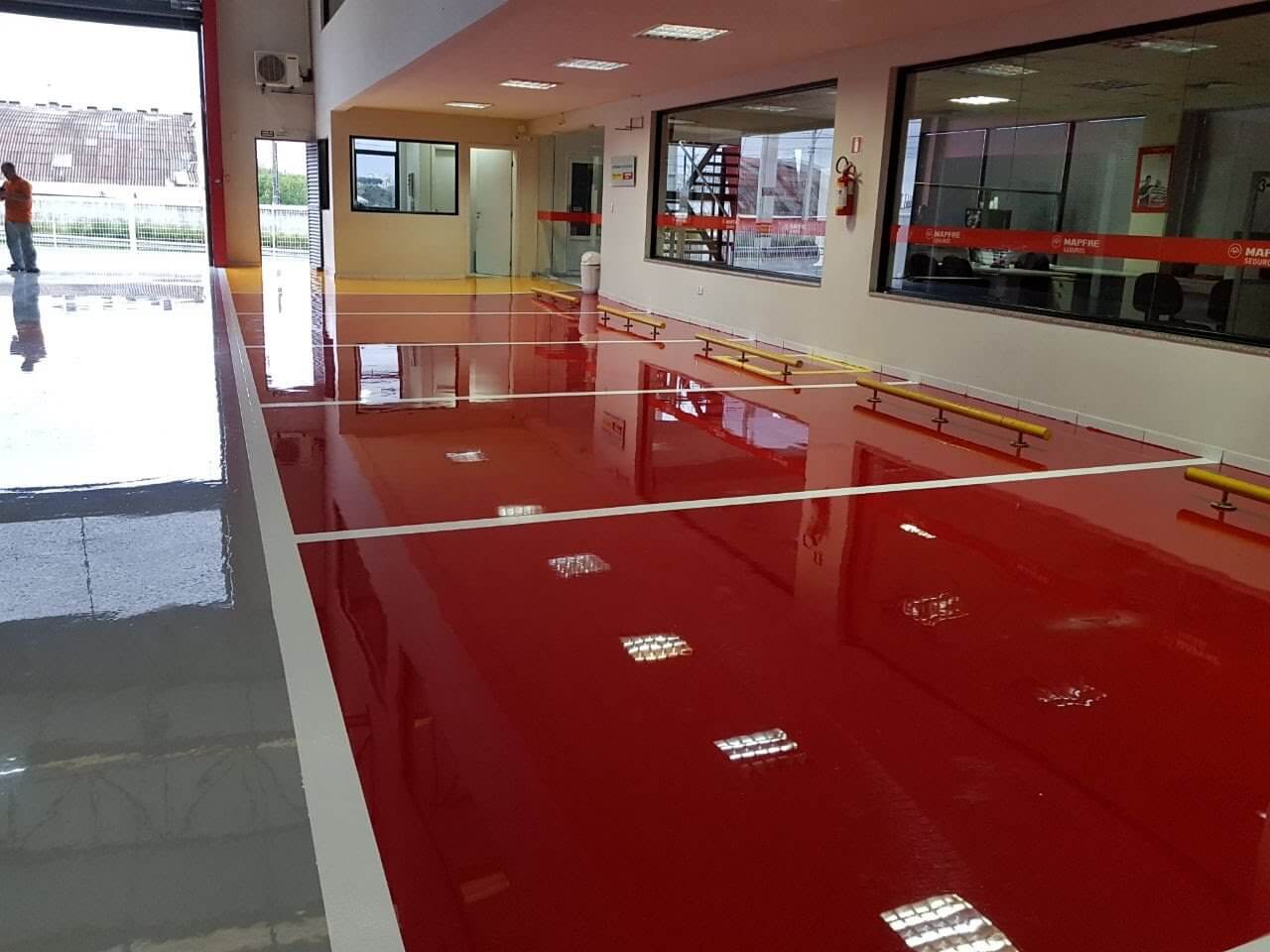 Piso epóxi conssecionaria